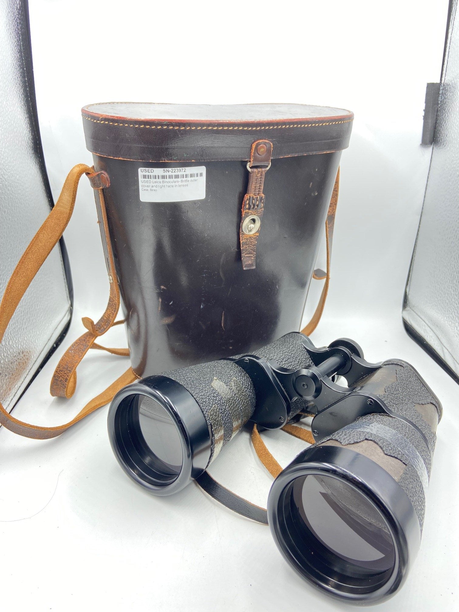 USED Leica Binoculars- Brittle outer cover and light haze in lenses